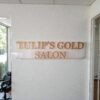 Tulip's Gold Salon Metal Name Plate on Acrylic Base